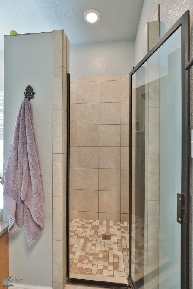 bathroom with an enclosed shower