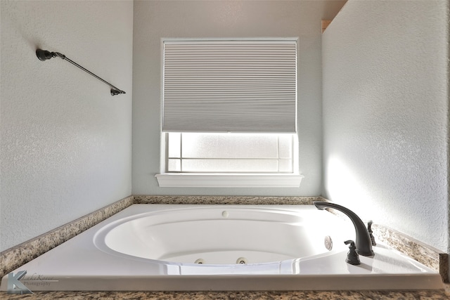 bathroom with a bathing tub