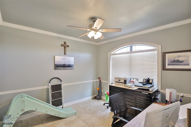 tiled office featuring crown molding, ceiling fan, and a textured ceiling