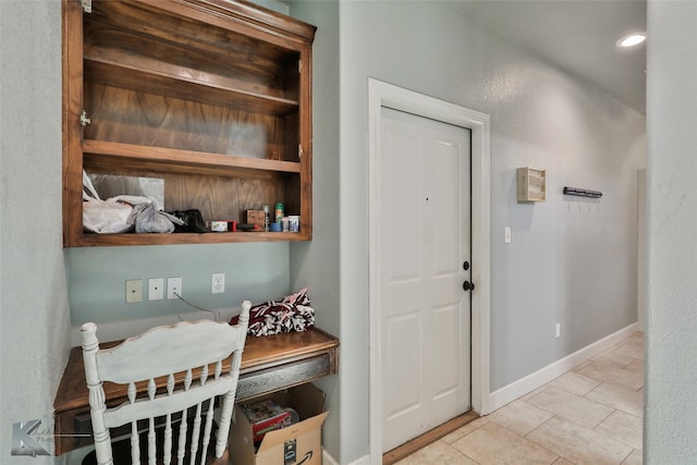 mudroom featuring light tile patterned flooring