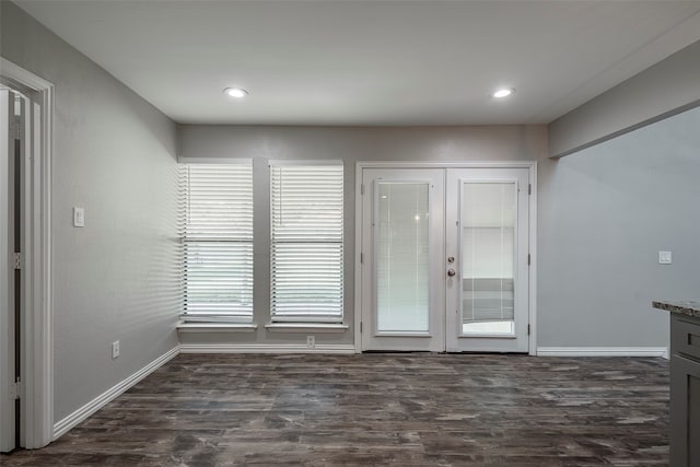 entryway with french doors and dark hardwood / wood-style floors