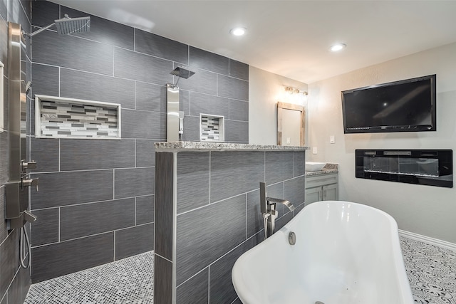 bathroom featuring vanity and separate shower and tub