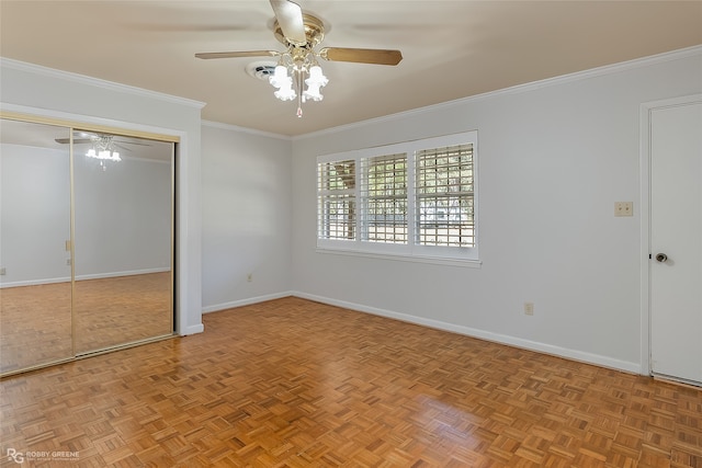 unfurnished bedroom featuring ceiling fan, light parquet flooring, and crown molding