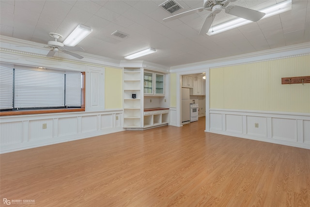 unfurnished living room with ornamental molding, light hardwood / wood-style flooring, and ceiling fan