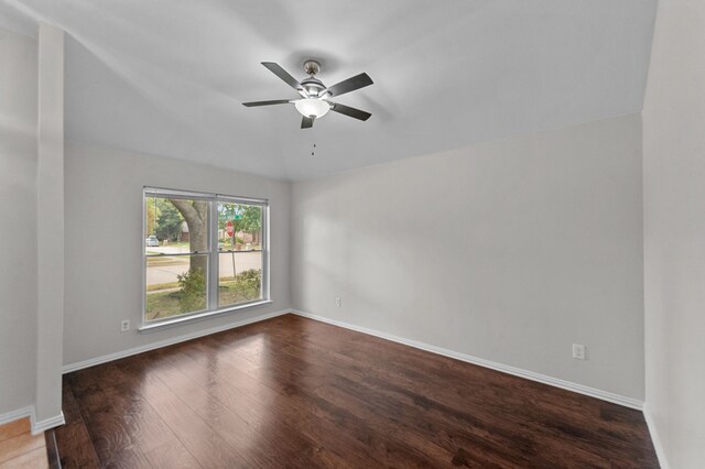 spare room with wood-type flooring and ceiling fan