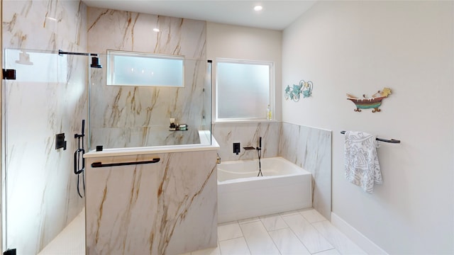 bathroom featuring tile patterned flooring, a wealth of natural light, and shower with separate bathtub