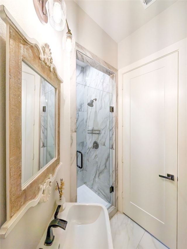 bathroom with an enclosed shower