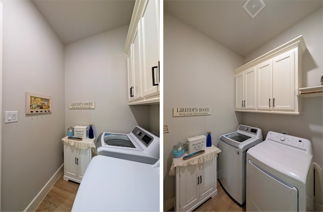 laundry area with cabinets, washing machine and clothes dryer, and light wood-type flooring