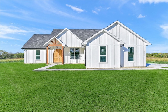 modern farmhouse with a front yard