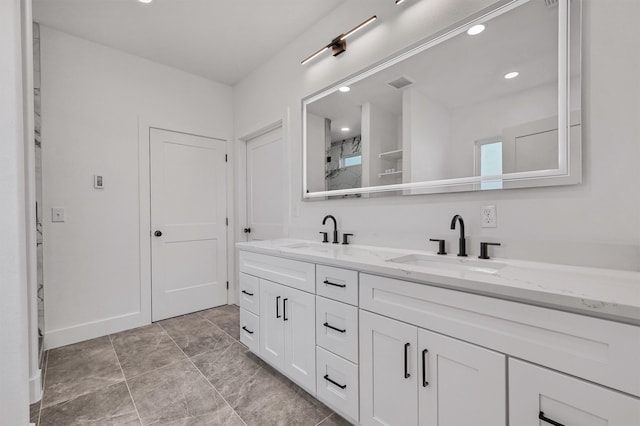 bathroom featuring vanity and walk in shower