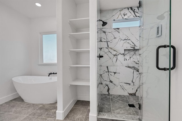 bathroom with shower with separate bathtub