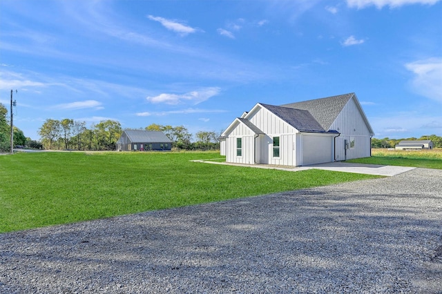 view of property exterior featuring a garage and a lawn