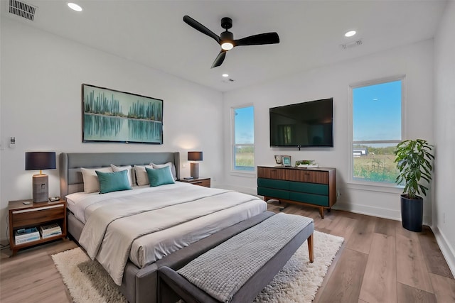 bedroom featuring ceiling fan and light wood-type flooring