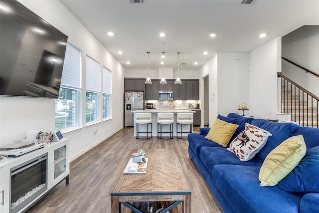 living room with hardwood / wood-style floors