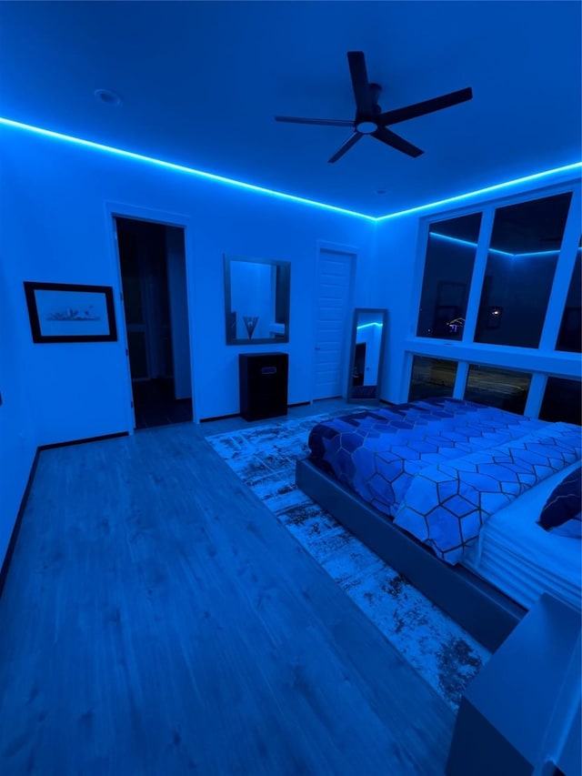 bedroom with hardwood / wood-style floors