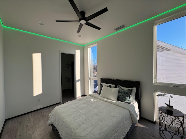 bedroom featuring ceiling fan and wood-type flooring