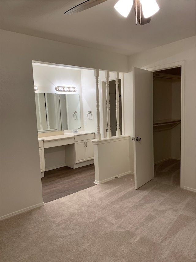 bathroom featuring vanity and ceiling fan