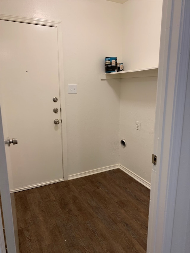 laundry room with dark wood-type flooring and hookup for an electric dryer