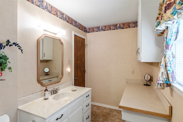 bathroom with vanity and tile patterned flooring