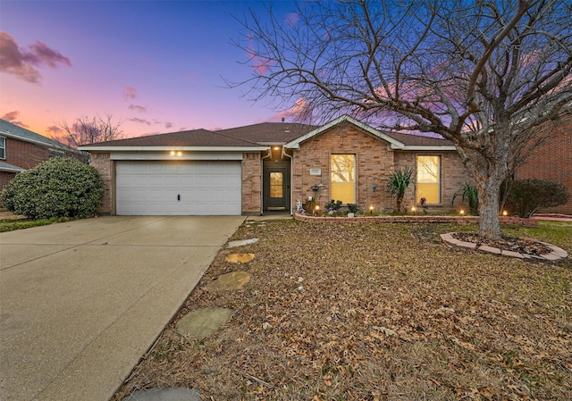 single story home featuring a garage