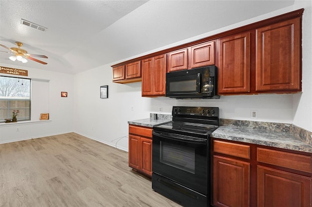 kitchen with a textured ceiling, ceiling fan, light hardwood / wood-style floors, and black appliances