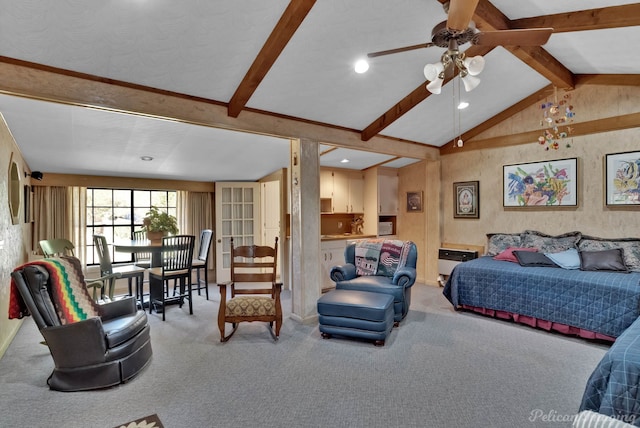 bedroom with carpet flooring, vaulted ceiling with beams, and ceiling fan