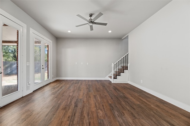 unfurnished room with french doors, dark wood-type flooring, and ceiling fan