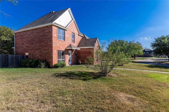 view of property exterior featuring a lawn