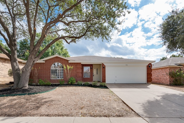 single story home with a garage