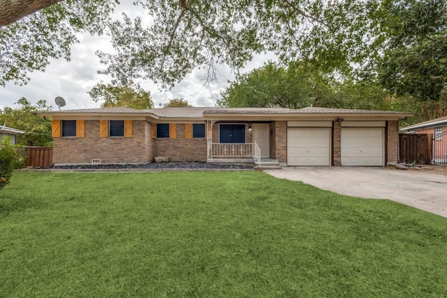 ranch-style home with a porch, a garage, and a front lawn