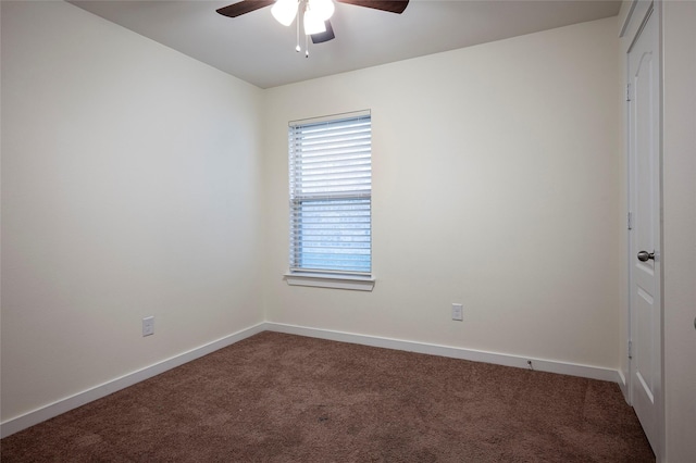 unfurnished room with carpet and ceiling fan