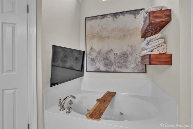 bathroom featuring a tub to relax in