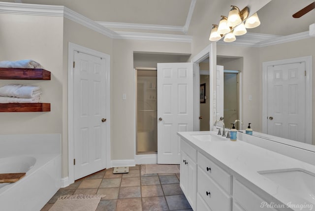 bathroom featuring crown molding, vanity, and independent shower and bath