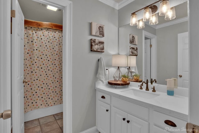 bathroom with tile patterned floors, vanity, and ornamental molding