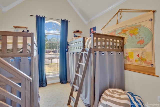 bedroom with ornamental molding, multiple windows, and vaulted ceiling