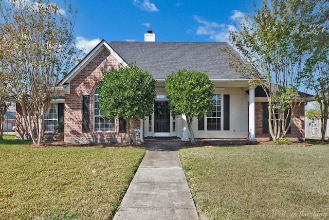 view of front of house with a front lawn