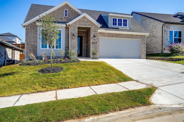 view of front of house with a front lawn and a garage