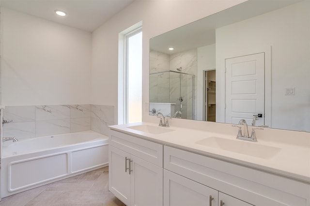 bathroom with vanity, plus walk in shower, and tile patterned floors