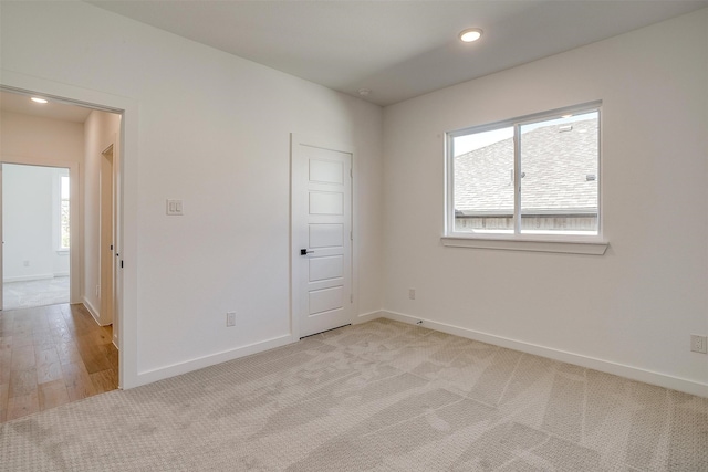 unfurnished room featuring light wood-type flooring