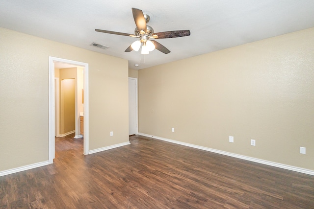 unfurnished bedroom featuring dark wood-type flooring and ceiling fan