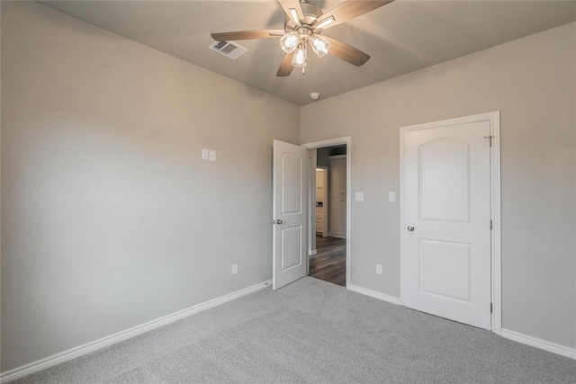 unfurnished bedroom with carpet and ceiling fan