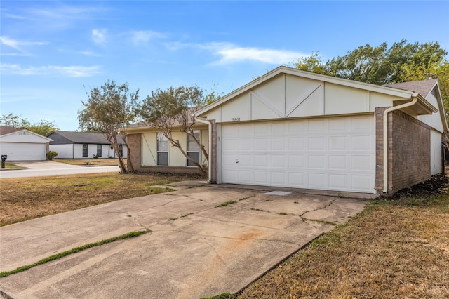 ranch-style home with a garage