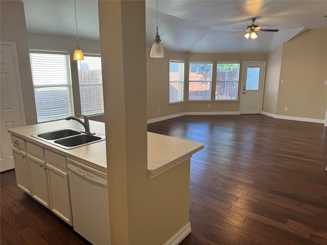 kitchen featuring dishwasher, decorative light fixtures, and a wealth of natural light