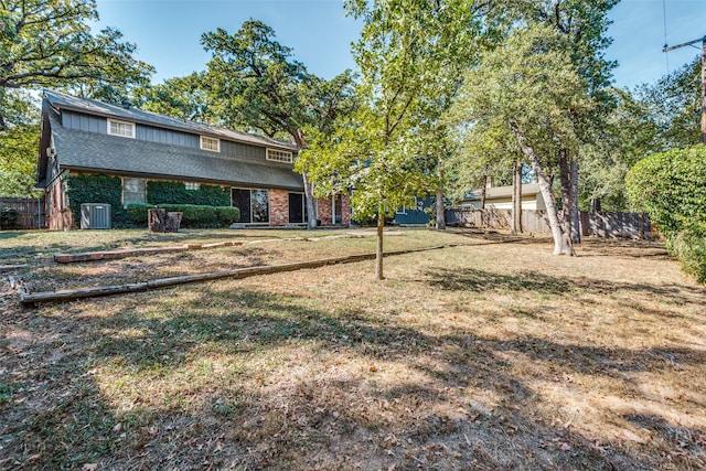 view of yard with central AC