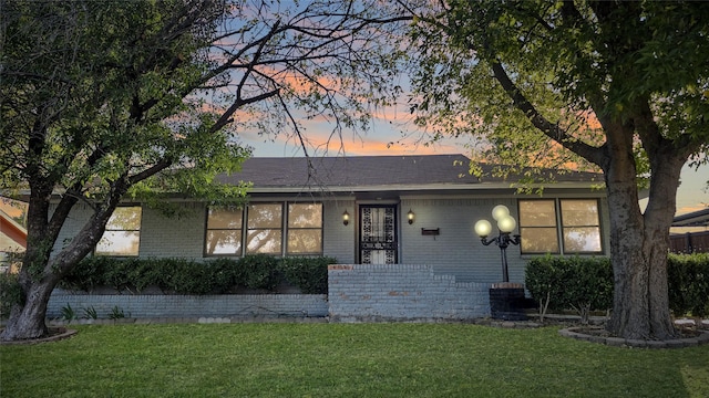 5706 Rocky Ridge Rd, Dallas, TX 75241 - single story home with brick siding and a lawn