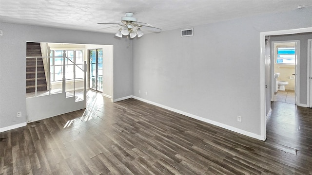 5706 Rocky Ridge Rd, Dallas, TX 75241 - empty room featuring plenty of natural light, a ceiling fan, and baseboards