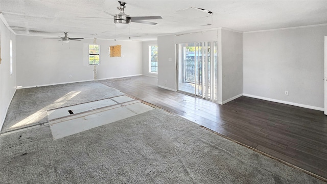 unfurnished room featuring ceiling fan, ornamental molding, a textured ceiling, and dark hardwood / wood-style floors