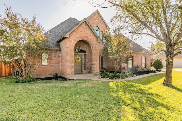 view of front of home with a front yard