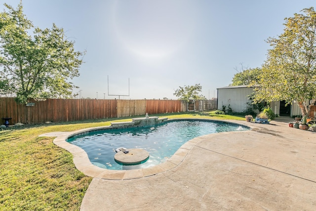 view of swimming pool featuring a patio and a lawn