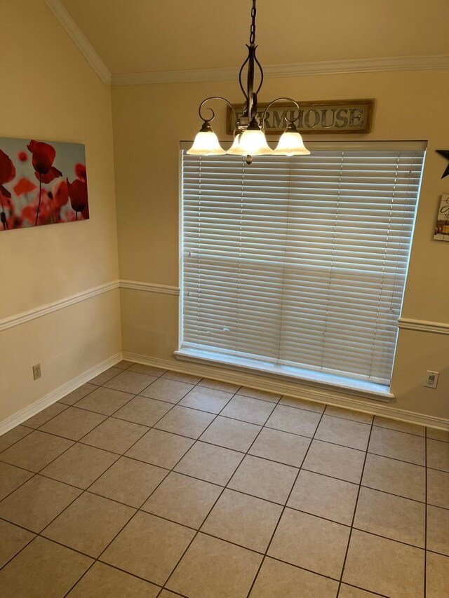 unfurnished dining area featuring crown molding, light tile patterned floors, and a notable chandelier